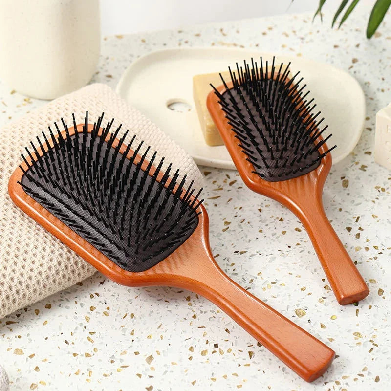 HydraVibe | Kopfhautmassage-Kamm mit Haaröl-Sprayfunktion
