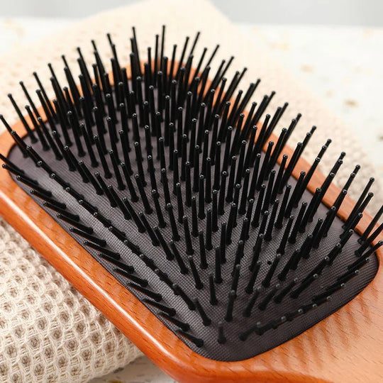 HydraVibe | Kopfhautmassage-Kamm mit Haaröl-Sprayfunktion