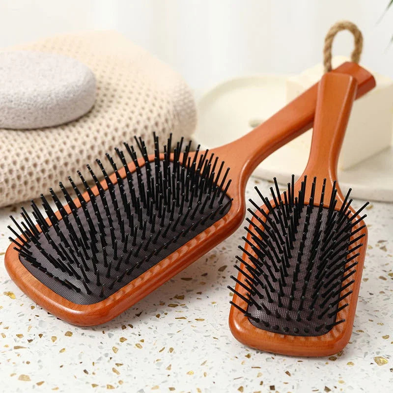 HydraVibe | Kopfhautmassage-Kamm mit Haaröl-Sprayfunktion