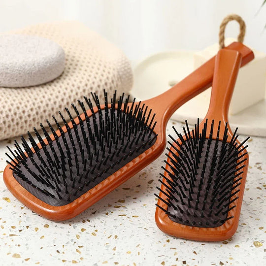 HydraVibe | Kopfhautmassage-Kamm mit Haaröl-Sprayfunktion