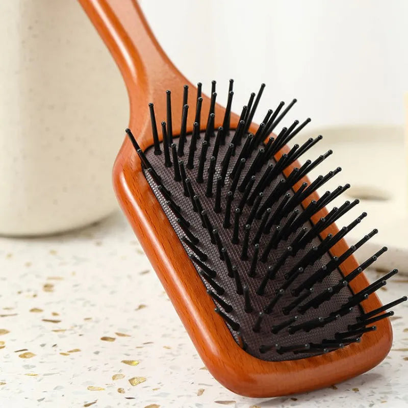 HydraVibe | Kopfhautmassage-Kamm mit Haaröl-Sprayfunktion