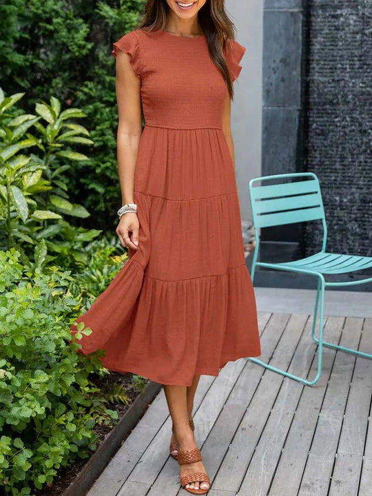 Elegantes Damenkleid mit Rüschendetails und praktischen Taschen für den Sommer-6