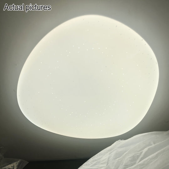 PebbleShine | Kieselstein-inspirierte LED-Leuchte mit Sternenlicht Decorique.de