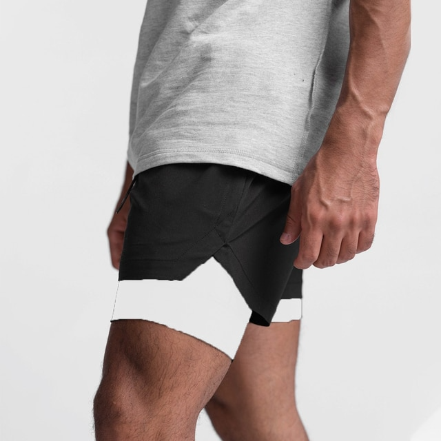 PowerFit | Komfortable Fitness-Shorts Schwarz-Weiß Futter Decorique.de