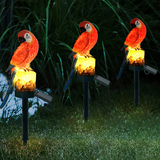 SolarParrot | Buntes LED Harz-Gartenlicht im Papageien-Design Rot Solar Decorique.de