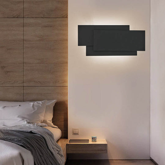 StackedGlow | Geometrische LED-Wandleuchte Schwarz Warmes Licht Decorique.de