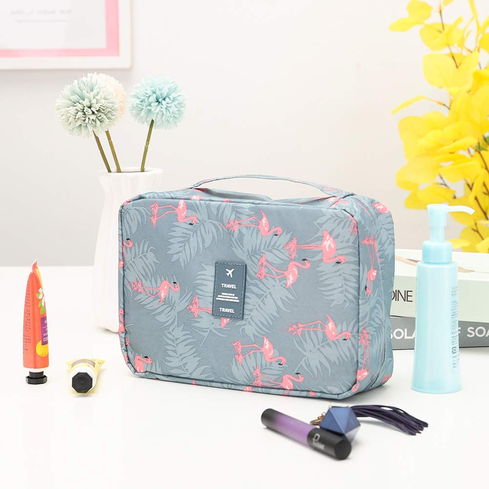 TravelEase | Wasserabweisende Reise-Kosmetiktasche mit Haken Flamingo Decorique.de
