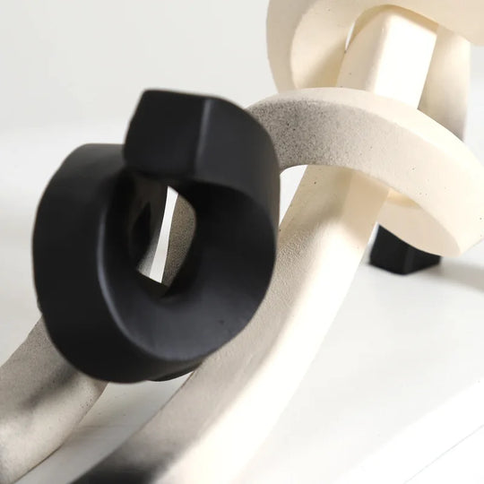 TwistCat | Abstrakte Siamkatzen-Skulptur in Harz Decorique.de