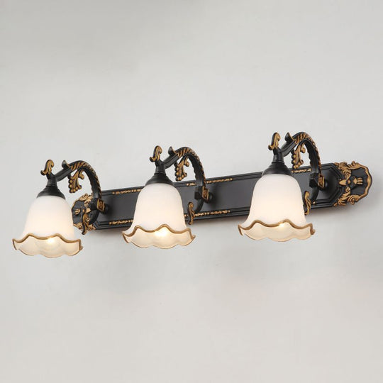 VintageLuxe | Vintage-inspirierte Wandleuchte Schwarz und Gold 3 Flammen Decorique.de